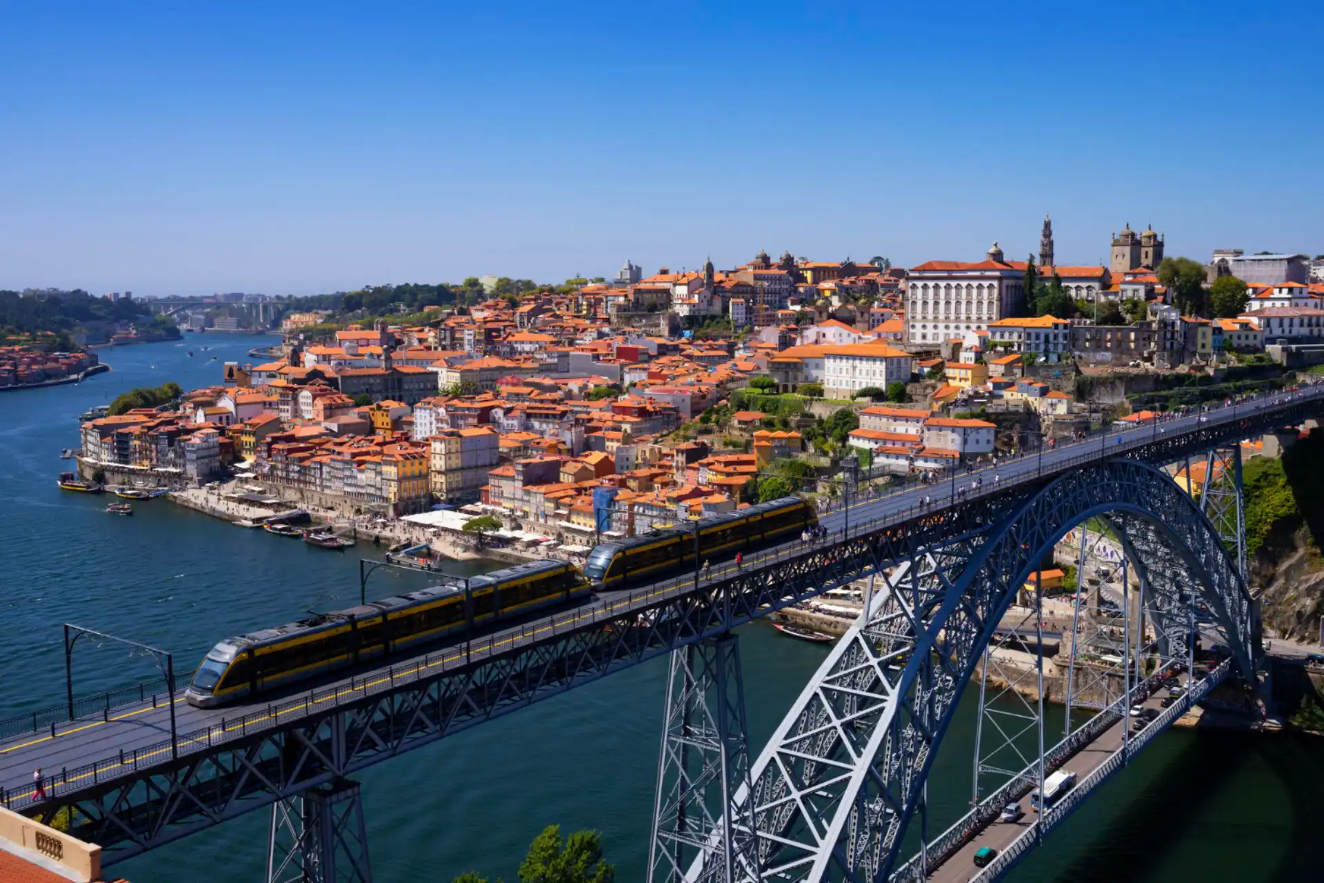 3550 Train on Dom Luís I Bridge, Porto cityscape